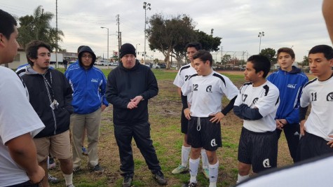 Despite being up 3-0 at halftime, Coach Launius wanted the Aviators to build onto their lead as he talks to them at halftime. Photo taken by Richard Estrella.