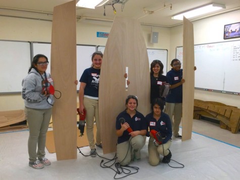 HMSA LifeSail members with their power tools and sailboat materials. Photo courtesy of Mr. Schulz.