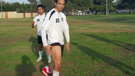 Jacob R. flexes his muscles after a win against RHP. Photo taken by Richard Estrella.