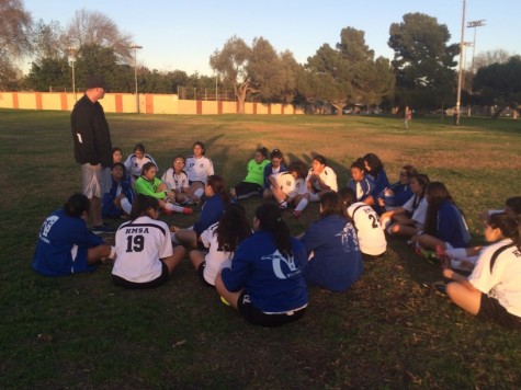 At half time, Coach Kircher talked to the Aviators and changed the second half's momentum. Photo taken by Miguel Sanchez.