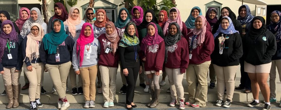 Students participating in the World Hijab Day join outside during lunch period for a group picture. (Photo by Leenah H.)