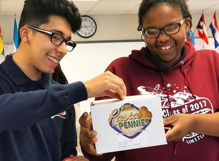 Students participate in the Leukemia and Lymphoma Society by donating money during CP  8. Pictured above are Juan B. and Nadesha A. Photo courtesy of the HMSA Key Club.  