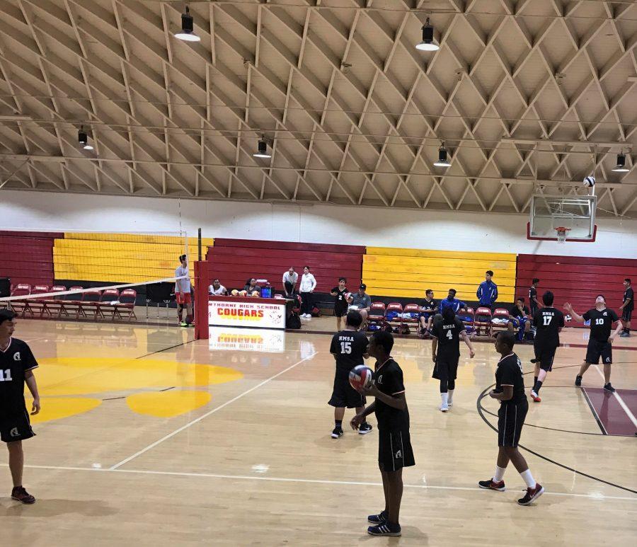 The Boys Volleyball Team warming up before their game against Hawthorne High. 