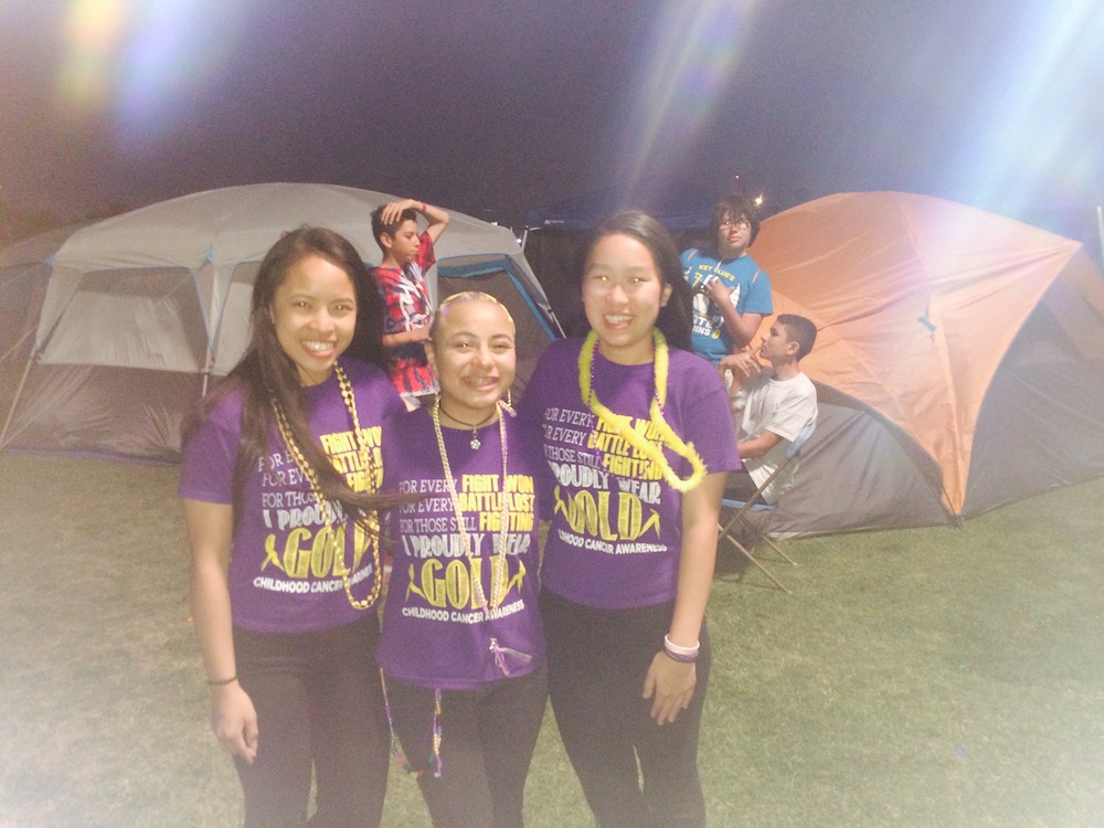 Hazel (left), Ayene (middle), and Katie (right) take part in the Relay for Life. 
Photo Source: Diana R.