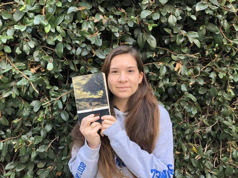 Valeria Gomez and the novel Wuthering Heights by Emily Bronte. Photo taken by Pedro Adame.