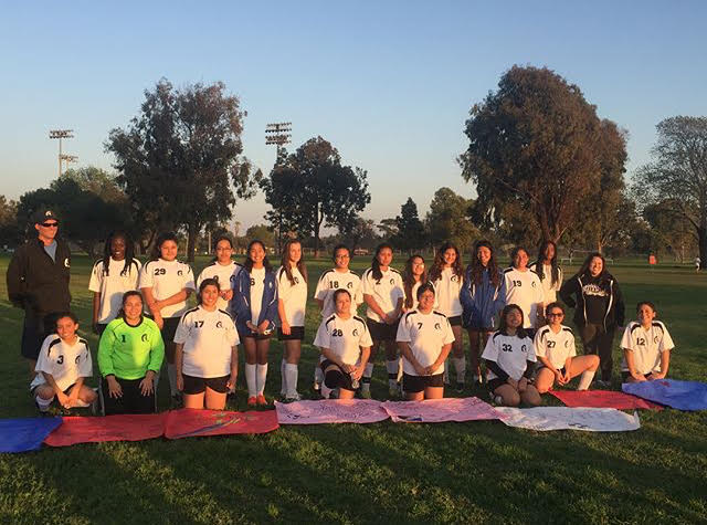 The girls took a team picture after senior night (Photo Source: Luisa Mejia).
