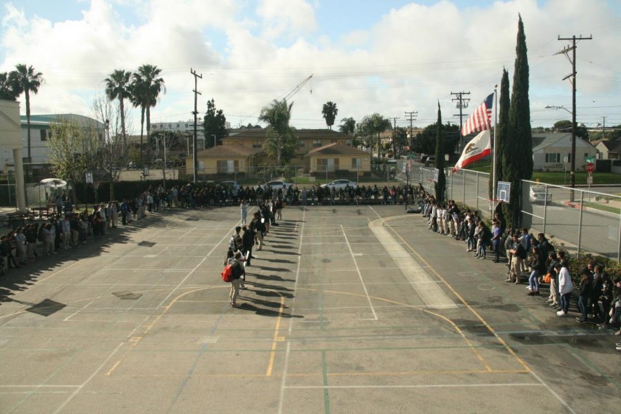 HMSA+students+and+staff+gathered+on+the+blacktop+for+the+memoriam.